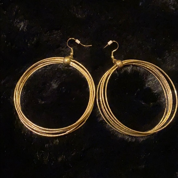 Fuego Gold Tone Hoop Earrings - Picture 2 of 6